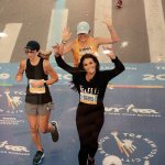The author's daughter, crossing the NYC Marathon finish line in 2019